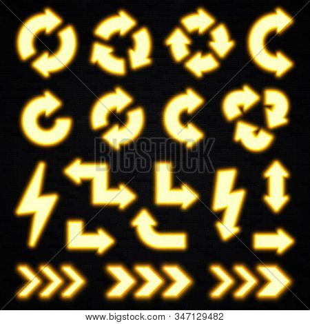 Glowing Yellow Neon Arrows Set On Black Brick Background. Shining Led Halogen Lamp Light Effect. Ill