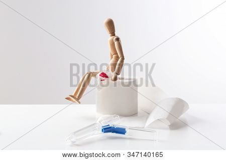 Composition With Anoscope On White Background. Hemorrhoid Treatment