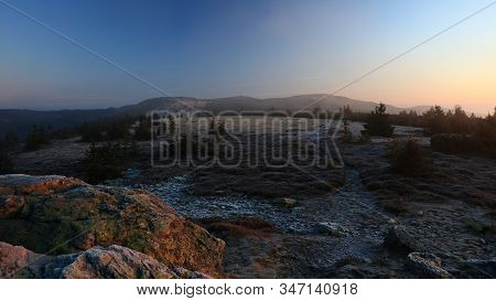 Meadows On Mountain Ridge During A Foggy Sunrise With Praded Transmitter In The Background, Jeseniky
