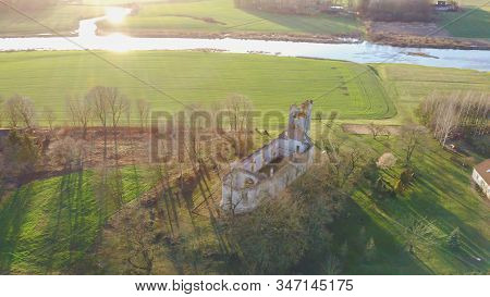 Ruins Of The Lutheran Church In Salgale Latvia Near Of The Bank Of The River Lielupe Aerial View