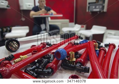 Water Pipes Pex And Mounting Tools On The Table. Plumbing