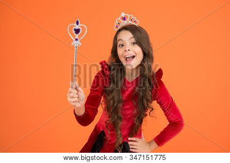 Excited Baby. Halloween Holiday. Magical Transformation. Imagine. Magic Trick. Magic Stick Concept. 