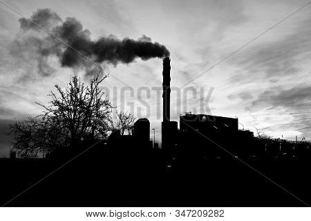 Factory And Chimney With Smoke In Black And White