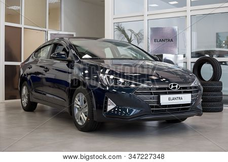 Russia, Izhevsk - January 23, 2020: New Modern Elantra Car In The Hyundai Showroom. Famous World Bra