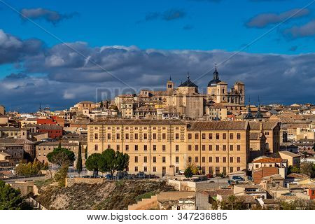 Toledo, Spain. Old City With Its Alcazar, Royal Palace Over The Tagus River Sinuosity. Spain, Europe