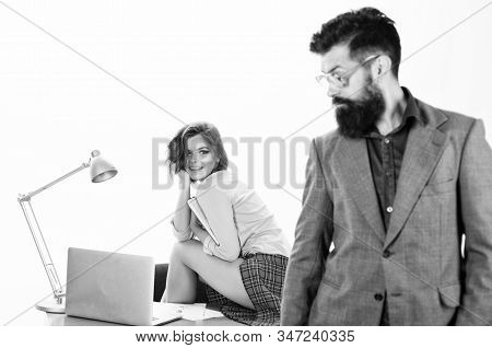 Man Bearded Boss Stand In Front Of Sexy Girl Working Laptop. Office Manager Or Secretary. Sexy Lady 