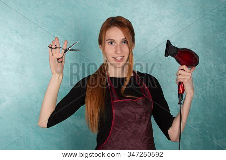 Girl Hairdresser Holds Fan And Scissors In Hands