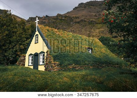 Historic Turf Church Hofskirkja In The Small Icelandic Village Of Hof, Iceland