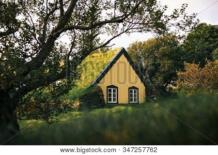 Historic Turf Church Hofskirkja In The Small Icelandic Village Of Hof, Iceland