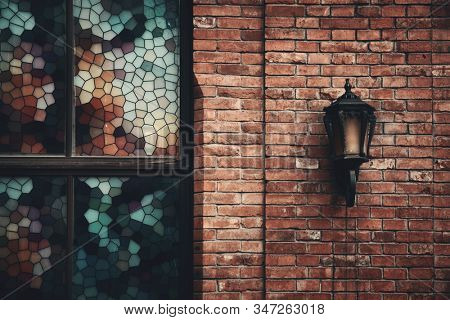 Road lamp and wall window patterns in Xiahao Old street in Chongqing, China.