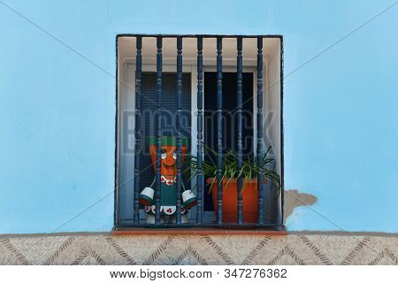 Blue village of Juzcar street view in Spain.