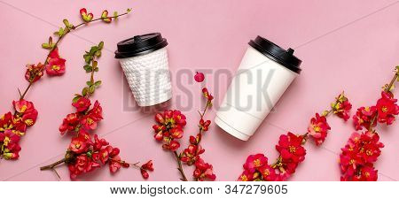 Coffee Or Tea Paper Cup, Spring Branches Of Red Flowers On Pink Background Top View Flat Lay Copy Sp