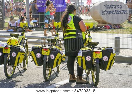 Yellow Ambulance Bicycles Magen David Adom With Text And Logoon The Street In Tel Aviv At A City Eve