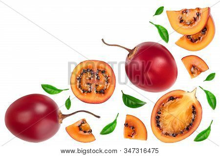 Fresh Tamarillo Fruit With Leaves Isolated On White Background With Copy Space For Your Text. Top Vi