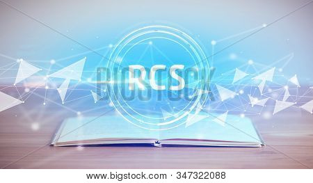Open book with RCS abbreviation, modern technology concept