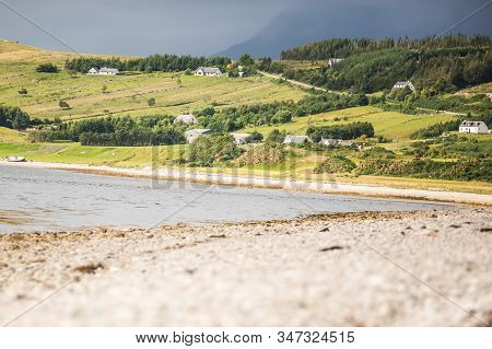 Beautiful Sunny Shores Of The Highlands Just Outside The Town Of Ullapool In Scotland