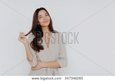 Isolated Shot Of Brunette Female Lawyer, Professional Advocate Wears Formal Clothing, Waits For Clie