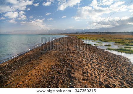 Karakul Lake And Pamir Range In Tajikistan. Landscape Around Pamir Highway M41 International Road