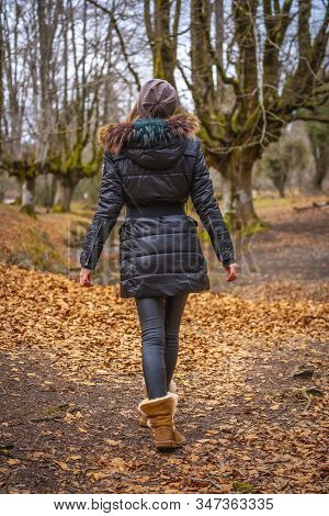 A Young Girl In The Otzarreta Forest In The Natural Park Of Gorbea, Bizkaia. Basque Country. Lifesty