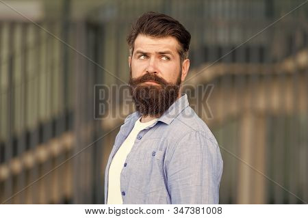 Declare Your Style. Serious Bearded Man. Handsome Brutal Man. Hair And Beard Care. Male Barber Care.