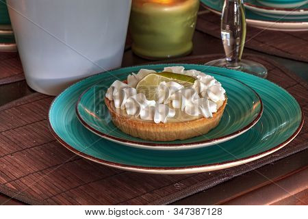 Green Keylime Pie Dessert On A Blue Plate