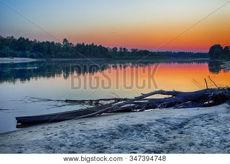 Tranquil And Peaceful Picturesque Landscape Of The Pripyat River With Wooden Boat At Foreground. Lak