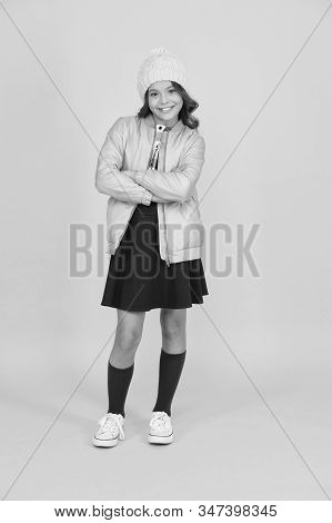 Cheerful Child Yellow Background. Beauty And Fashion For Kid. Back To School. Ready For Winter Vacat