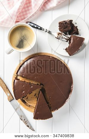 Chocolate brownies cake on cutting board.