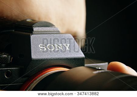 Bishkek, Kyrgyzstan - December 15, 2019: Man Holds A Sony A7 Camera In His Hands And Takes Images In