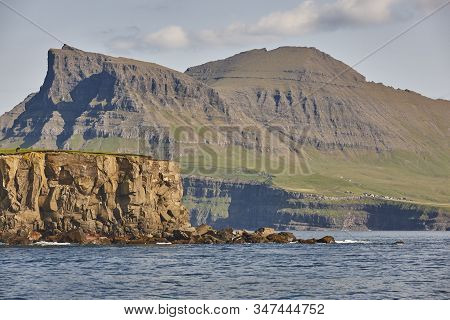 Faroe Islands Sunset Dramatic Coastline Landscape . Vagar Island. Seascape