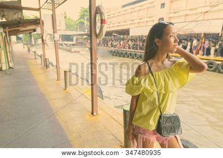Young Beautiful Tourist Woman Exploring The City