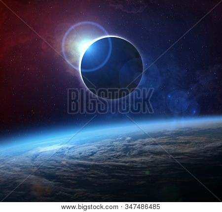 Solar Eclipse And Earth. The Moon Covers The Sun In A Solar Eclipse. Elements Of This Image Furnishe