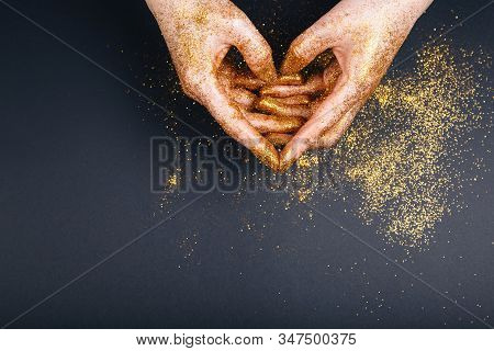 Female Hand Showing Heart Shape Gesture. Fastive Background, Space For Text