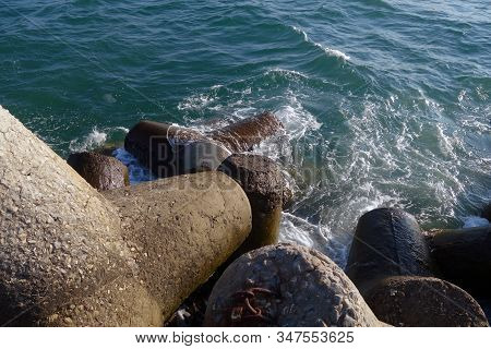 Breakwater Stones On Mole At Black Sea. Sea View And Vackground