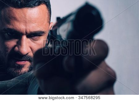 Need For Revenge. Close Up Gun Barrel. Killer Or Murderer Concept. Head Hunting. Man Handsome Mafia 