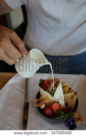 Shaverma Fruit Roll With Vegetables And Fruit And Sauce