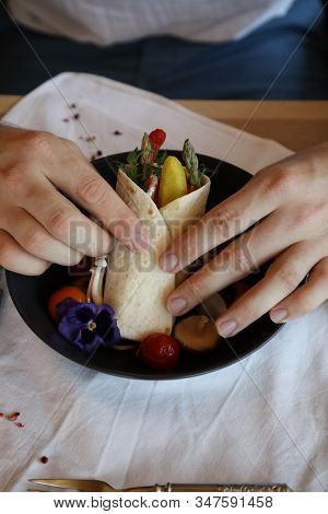 Shaverma Fruit Roll With Vegetables And Fruit And Sauce