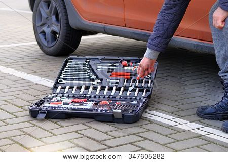 Toolset Near The Auto. Mechanical Workshop Tools. Сar Mechanic Using Different Repair Tools For Repa