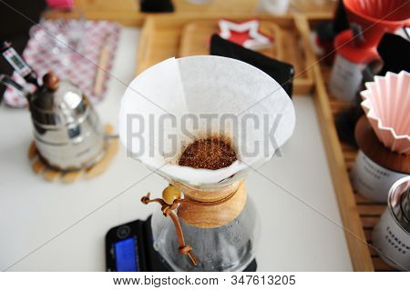 Alterantive Manual Coffee Brewing Still Life. Ground Coffee In Paper Filter Dripper. Third Wave Spei