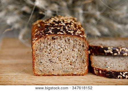 Whole Wheat Gluten Free Bread With Flax Seads Sunflower Chia Seads Sesame. Side View With Copy Space