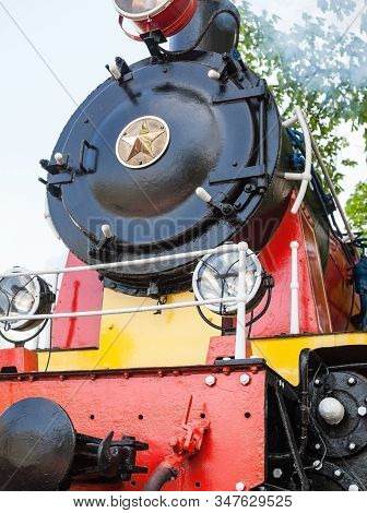 Old Soviet Steam Locomotive Blowing Off The Steam Out Of The Whistle