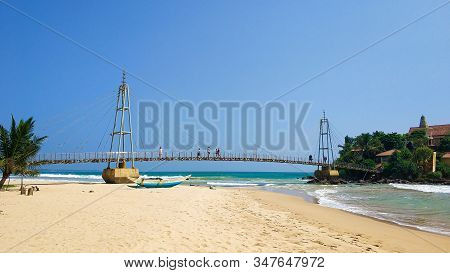 Bridge From The Beach To The Island In The Ocean. Matara / Sri Lanka - 02.08.2018