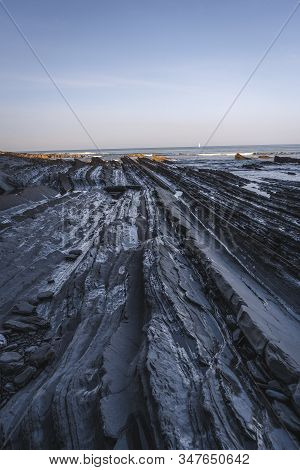 Details Of The Geopark Overlooking The Sea In Sakoneta At Deba At Low Tide. Basque Country