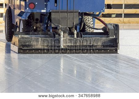 Special Machine For Cleaning Ice On An Ice Rink. Transport Industry. Street Ice Rink Service