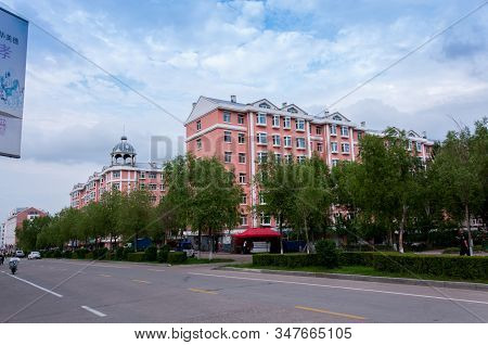 China, Heihe, July 2019: Road With Cars, Streets Of The Chinese City Of Heihe In The Summer
