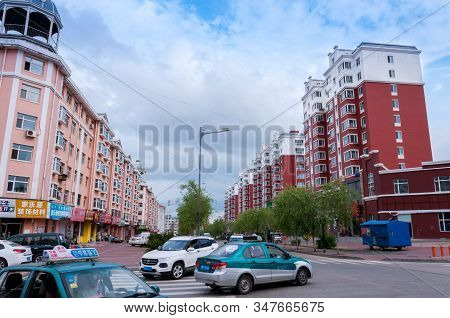 China, Heihe, July 2019: Road With Cars, Streets Of The Chinese City Of Heihe In The Summer