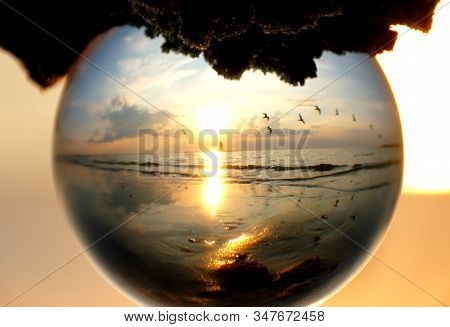 Beautiful Sunset Captured Through A Glass Lens Ball At Cape Henlopen State Park, Lewes, Delaware, U.