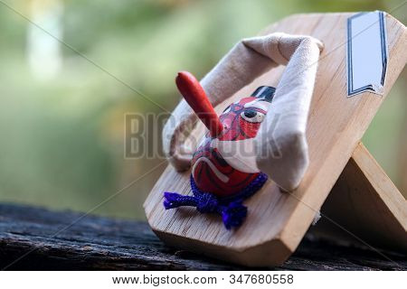 Tengu Japanese Traditional Mask On Japanese Clogs
