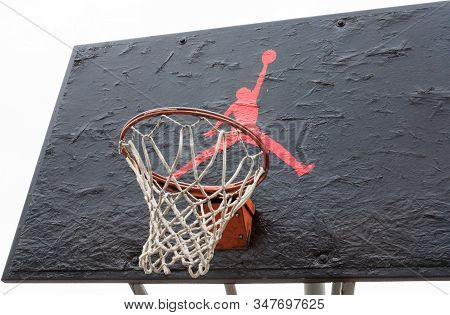 Kyiv, Ukraine -  April 21, 2016: Jumpman Logo By Nike Painted On The Black Backboard Of The Old Bask