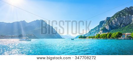 Lecco Town In Como Lake District And Ferry Boat. Italian Travel Destinatio. Italy, Europe.